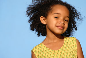 young girl with curly hair